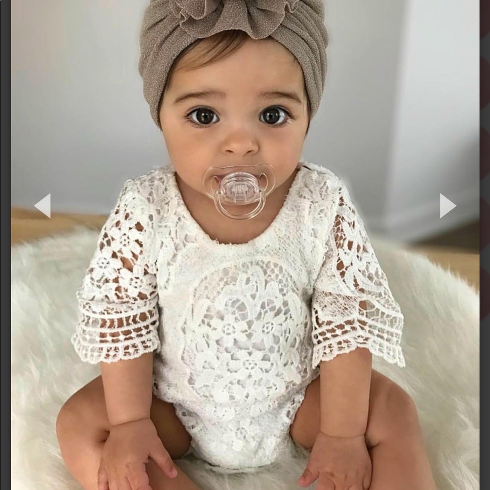 White lace baby onesie